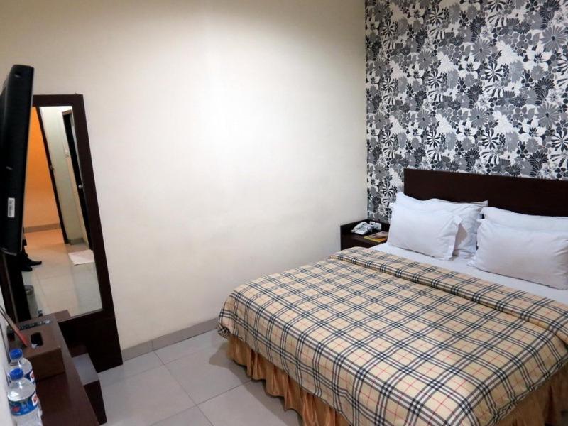 Vindhika Hotel Makassar Chambre photo