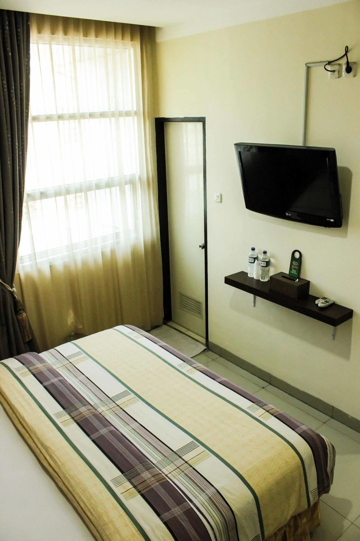 Vindhika Hotel Makassar Extérieur photo